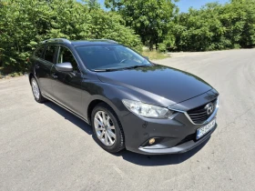 ������ Mazda 6