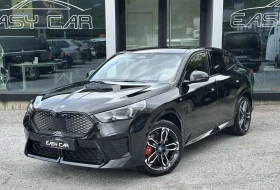 BMW iX2 eDrive20, снимка 1