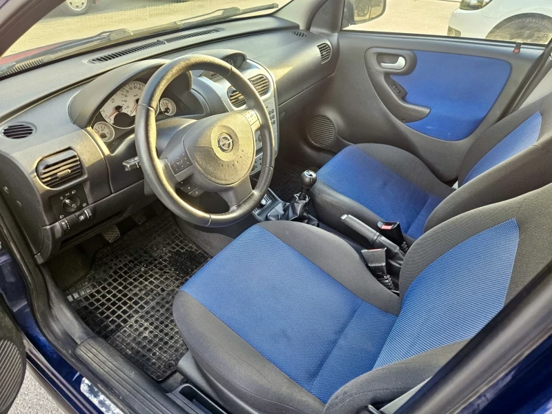 Opel Corsa 1.2 Twinport, снимка 9 - Автомобили и джипове - 52553654