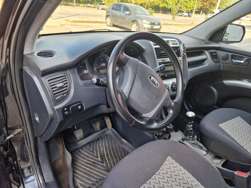 Kia Sportage, снимка 12 - Автомобили и джипове - 47361719