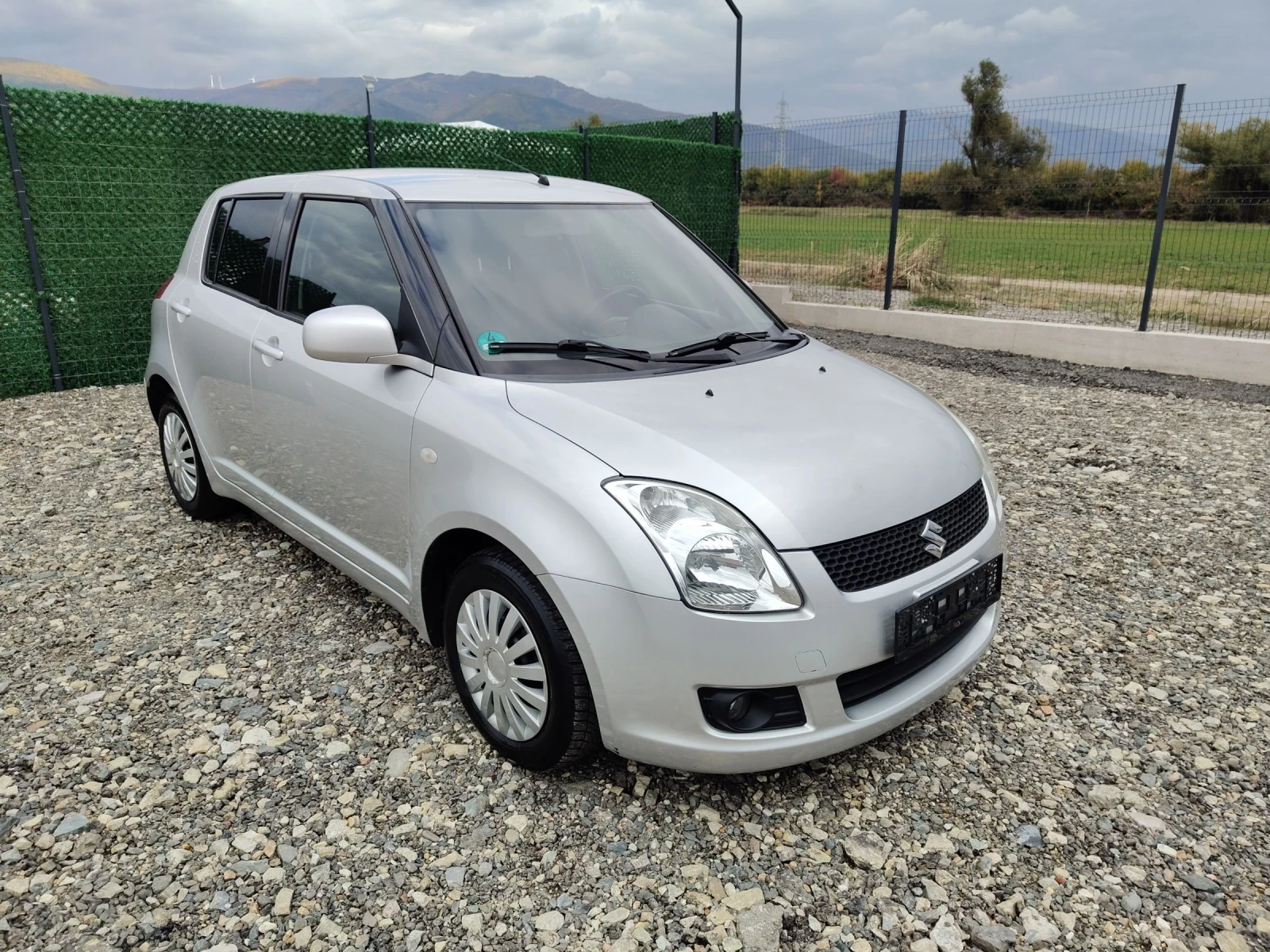 Suzuki Swift 1.3 i 92 ks - изображение 8