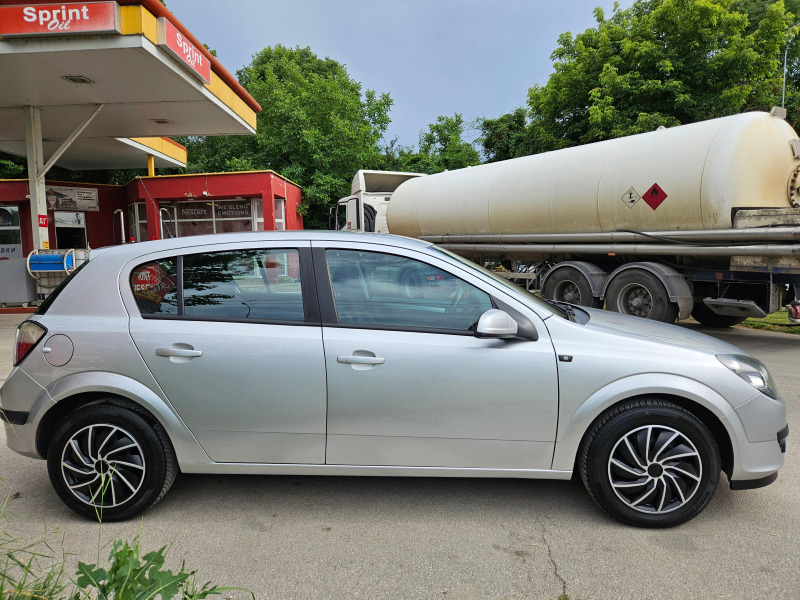 Opel Astra 1.8, 125к.с., XENON!, снимка 4 - Автомобили и джипове - 46192317