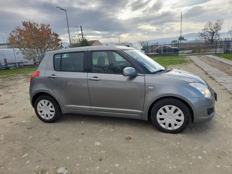 Suzuki Swift 1.3 DDIS, снимка 10 - Автомобили и джипове - 52535214
