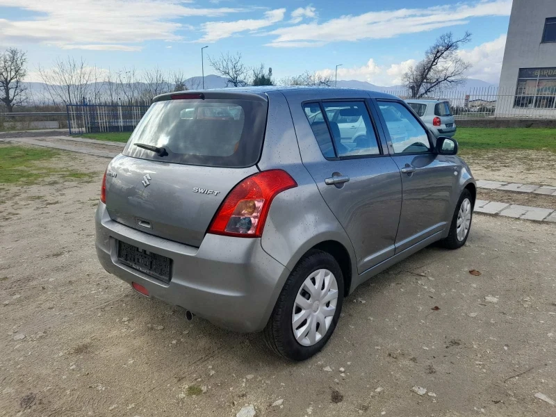 Suzuki Swift 1.3 DDIS, снимка 8 - Автомобили и джипове - 52535214