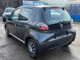 Toyota Aygo 1.0VVT-i 68к.с Навигация Климатик-5 врати-Италия - 3100 € / 6063.07 лв. - 13794311 4