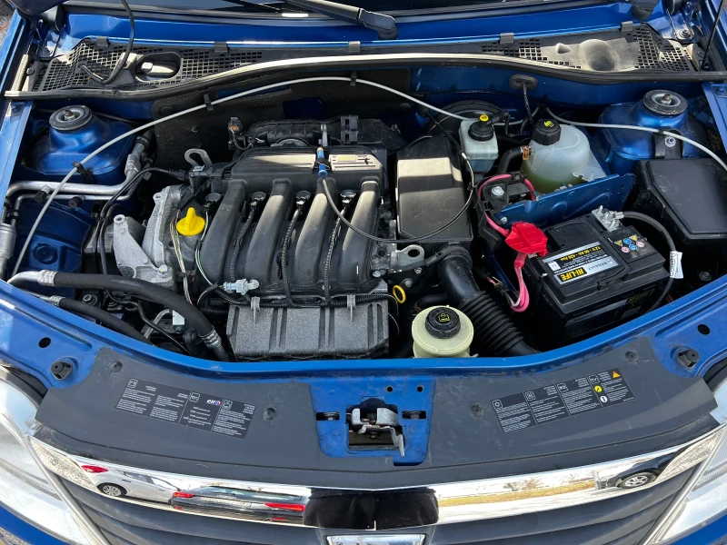 Dacia Logan 1.6i 173000km SWISS, снимка 17 - Автомобили и джипове - 53536857