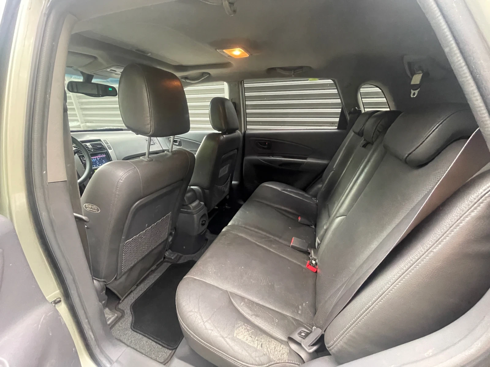 Hyundai Tucson 2.0 CRDI, снимка 11 - Автомобили и джипове - 56301027