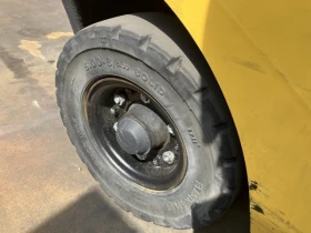      Komatsu     
