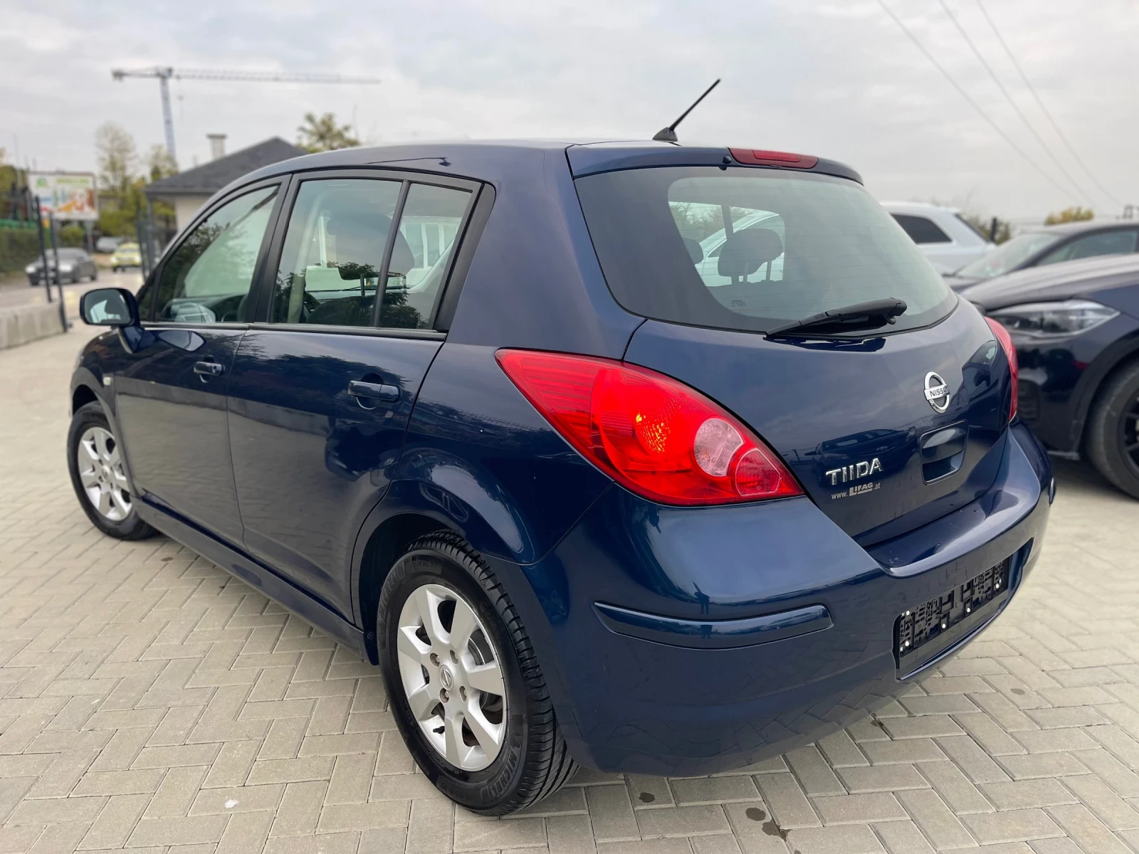 Nissan Tiida  - изображение 6