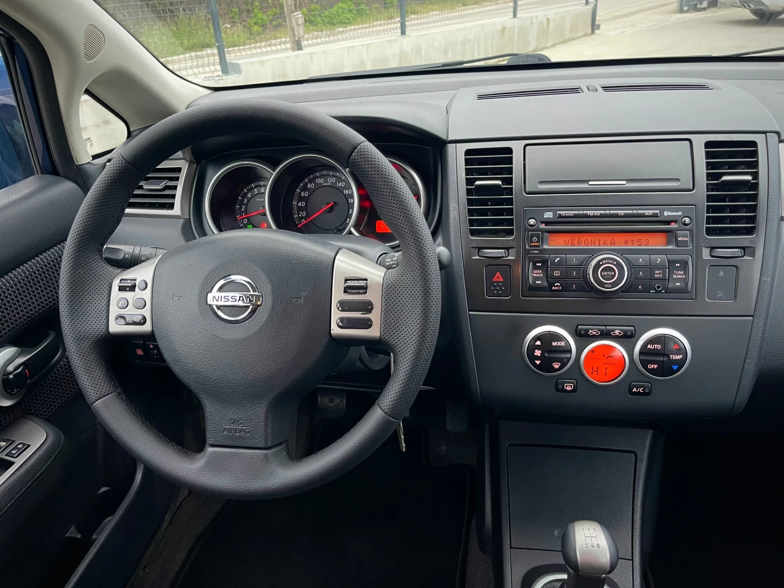Nissan Tiida  - изображение 9