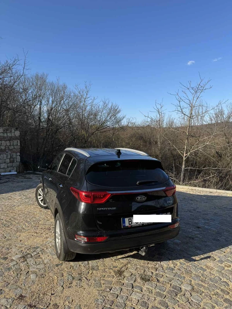 Kia Sportage 2.0 CRDI 4x4 NAVI, снимка 4 - Автомобили и джипове - 49048777