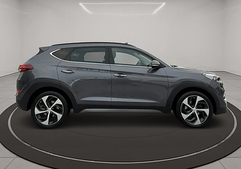 Hyundai Tucson, снимка 8 - Автомобили и джипове - 52031910