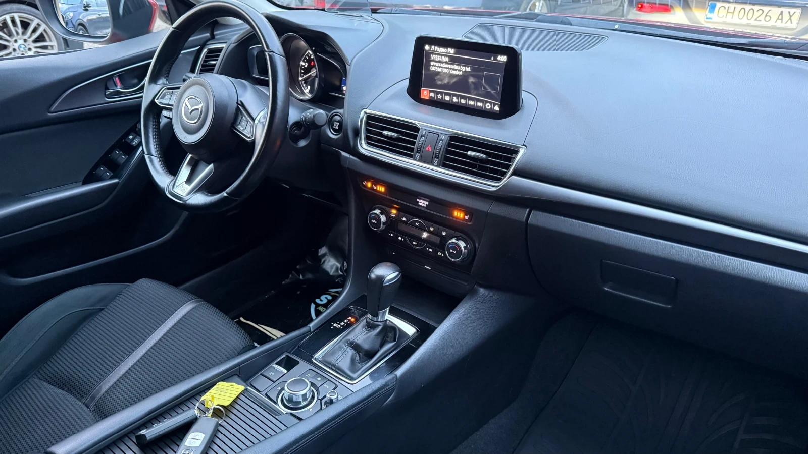 Mazda 3 HeadUp* КАМЕРА* BOSE* KeyL* ПОДГРЕВ* FULL, снимка 12 - Автомобили и джипове - 56713075