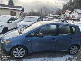 Mitsubishi Colt 1.1 климатик Евро 4  - 1700 € / 3324.91 лв. - 94931842 2