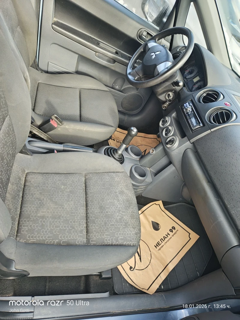 Mitsubishi Colt 1.1 климатик Евро 4 , снимка 15 - Автомобили и джипове - 53140713