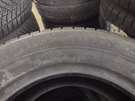 Гуми Зимни 215/65R15, снимка 6 - Гуми и джанти - 46786684