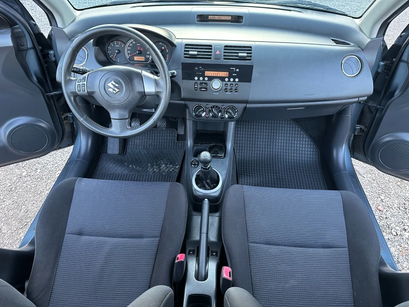 Suzuki Swift 1.3I 4X4 90kc, снимка 11 - Автомобили и джипове - 44899092