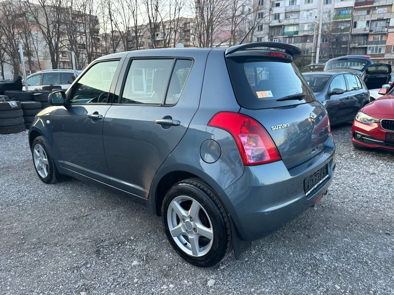 Suzuki Swift 1.3I 4X4 90kc, снимка 3 - Автомобили и джипове - 44899092