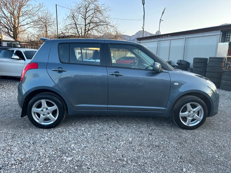 Suzuki Swift 1.3I 4X4 90kc, снимка 6 - Автомобили и джипове - 44899092