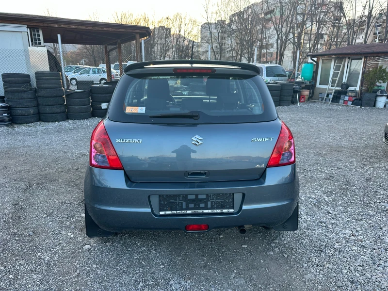 Suzuki Swift 1.3I 4X4 90kc, снимка 4 - Автомобили и джипове - 44899092