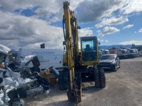 Багер Takeuchi TB 070W, снимка 6