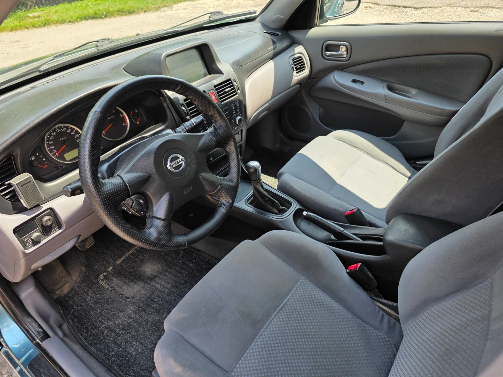 Nissan Almera 1.5 dci, снимка 8 - Автомобили и джипове - 55206137