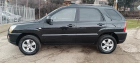 Kia Sportage 2.0i LPG  - 5199 € / 10168.36 лв. - 17731906 2