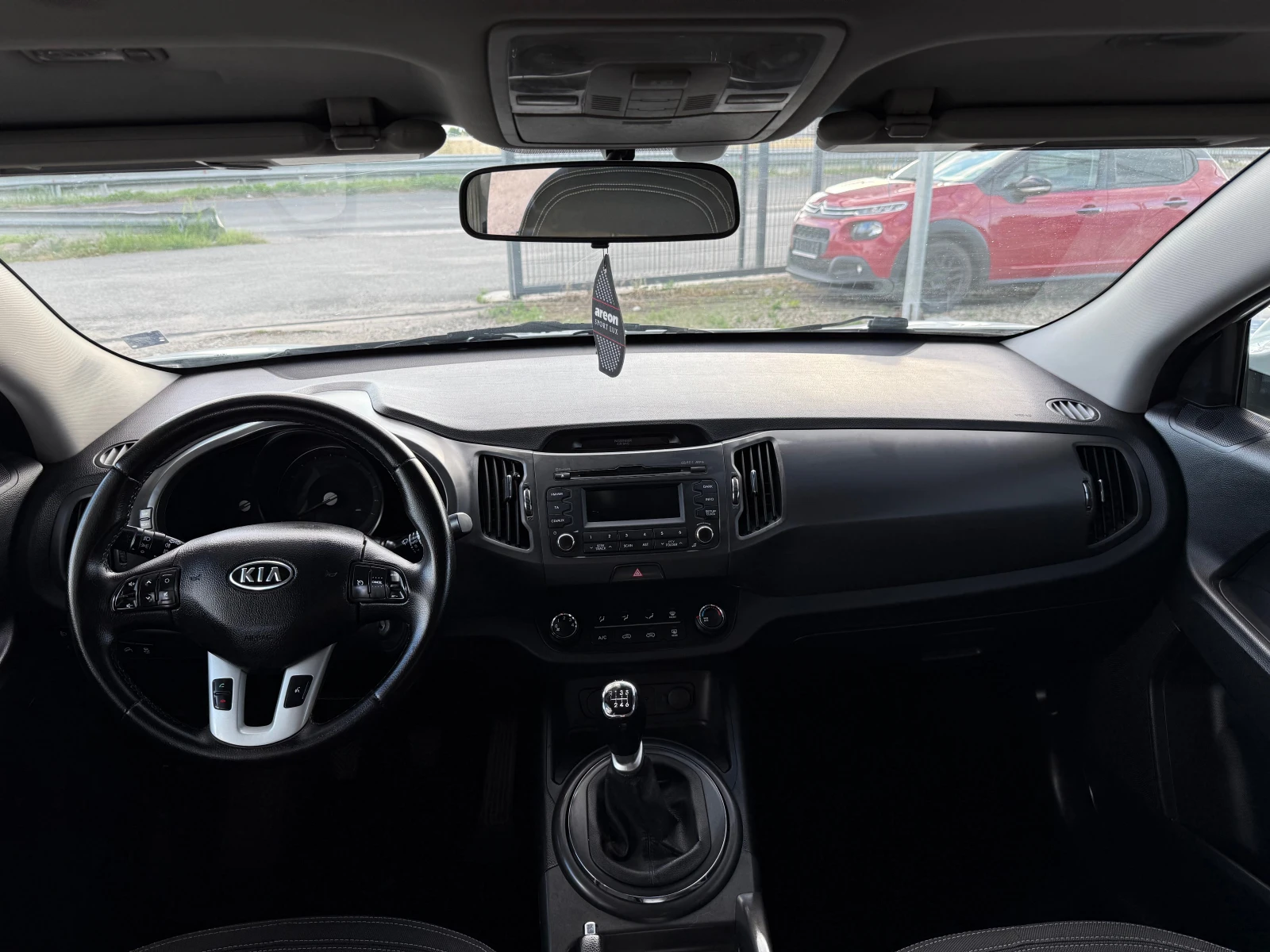 Kia Sportage 1.6 i, снимка 11 - Автомобили и джипове - 54895644