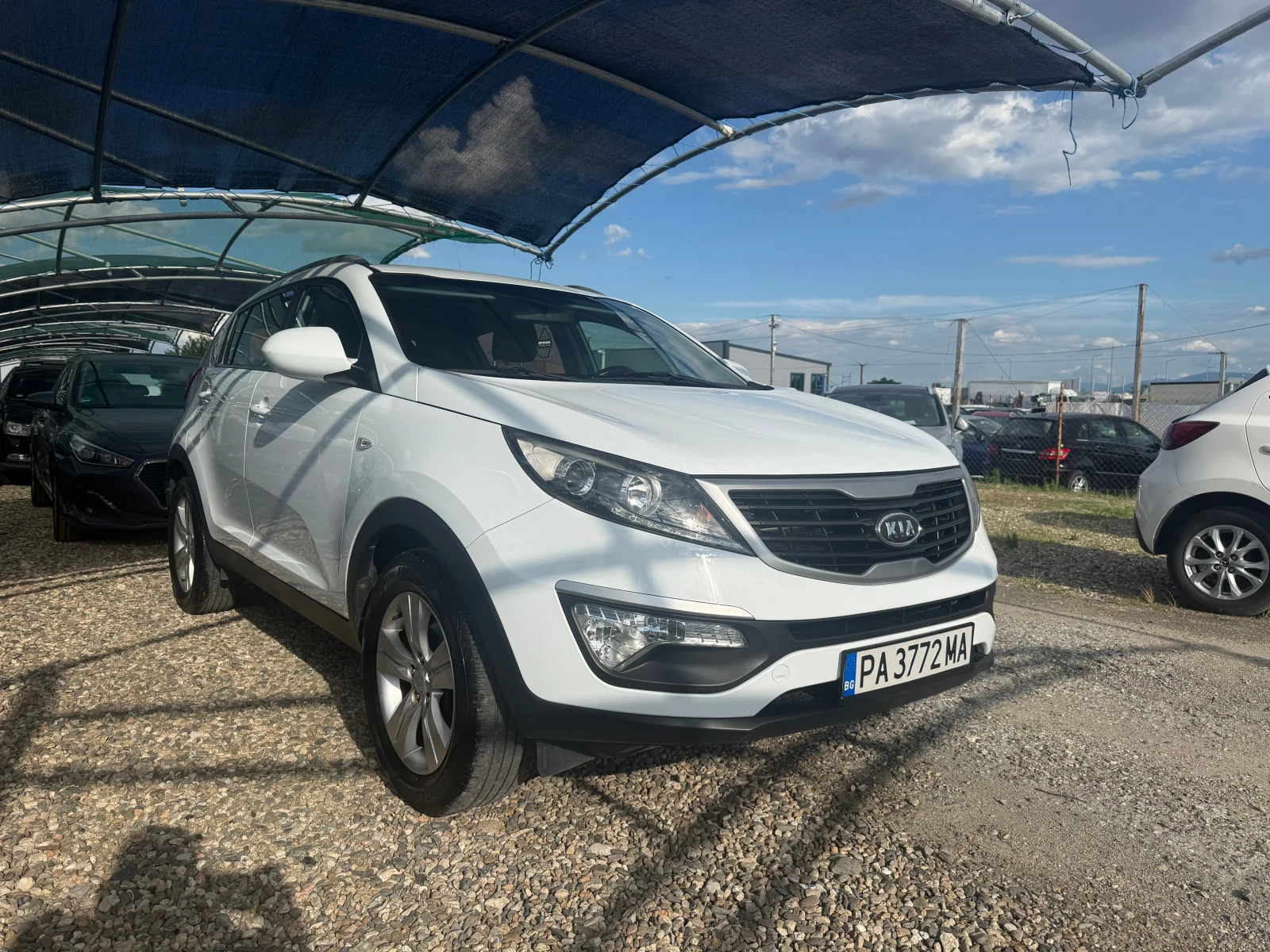 Kia Sportage 1.6 i, снимка 3 - Автомобили и джипове - 54895644