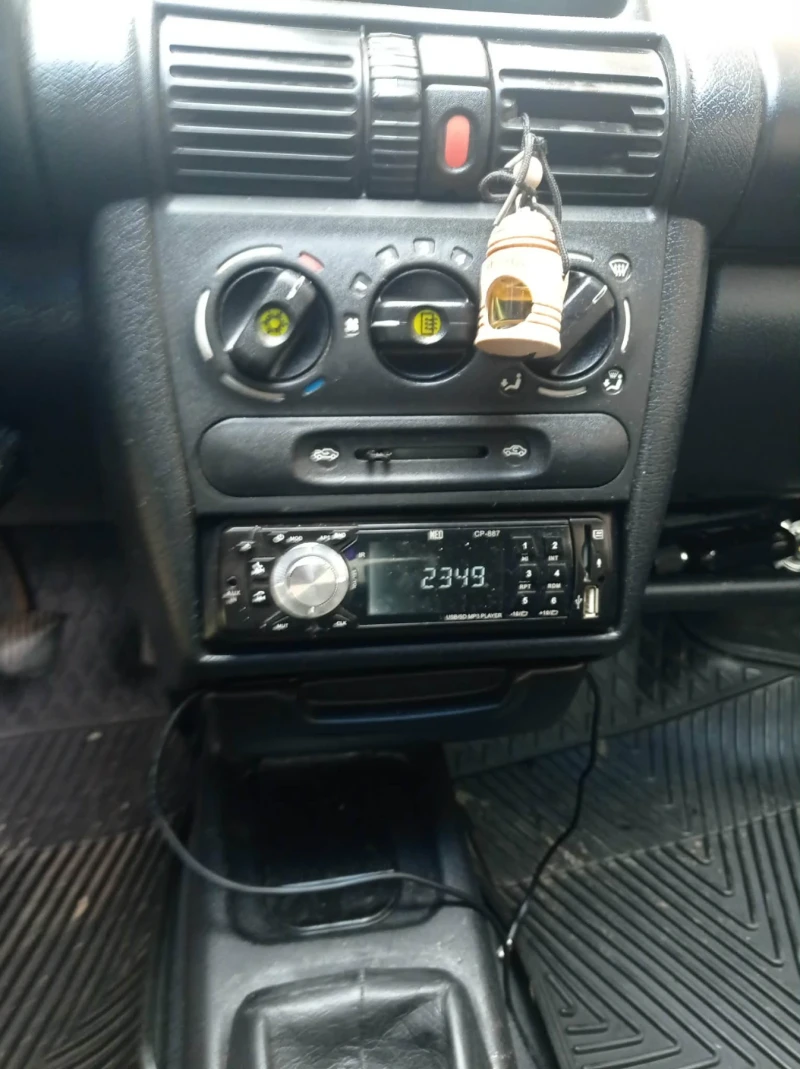 Opel Tigra 90.k.s, снимка 14 - Автомобили и джипове - 53089894