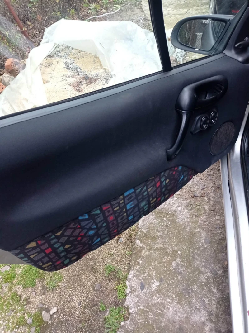 Opel Tigra 90.k.s, снимка 13 - Автомобили и джипове - 53089894