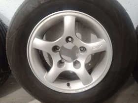    205/70R15  Suzuki Jimny | Mobile.bg    3