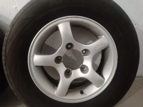    205/70R15  Suzuki Jimny | Mobile.bg    5