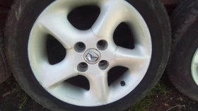 ����� �� �������� �� ���� � ������ 185/65R15 �� Mazda 323