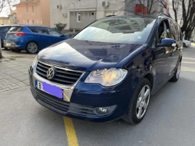 VW Touran 1.6I-102KC-Газ - 3700 € / 7236.57 лв. - 12127120 2