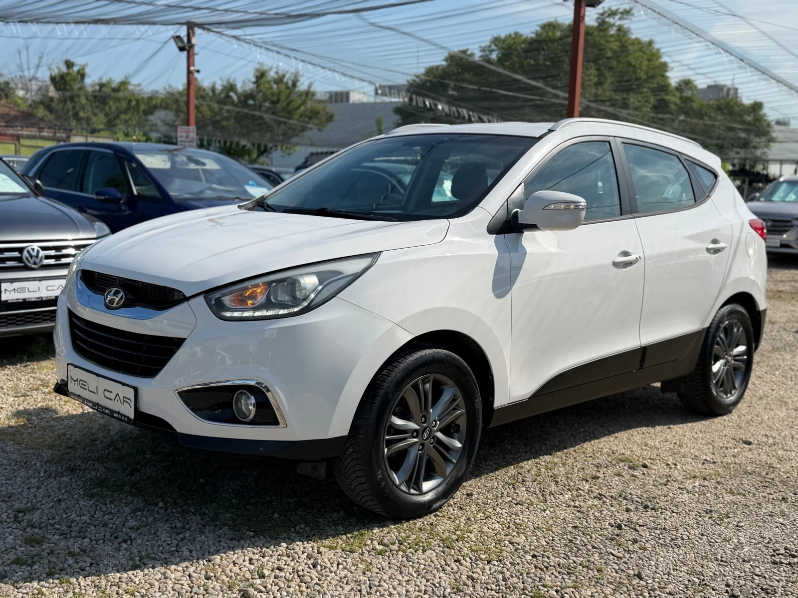 Hyundai IX35 2.0CRDI НАВИ 4х4КОЖА ПОДГРЕВ ВИДЕО ТЕГЛИЧ ЛИЗИНГ, снимка 13 - Автомобили и джипове - 54997239