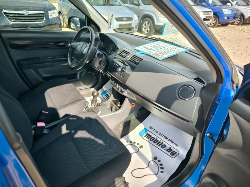 Suzuki Swift 1.3I 4X4, снимка 8 - Автомобили и джипове - 44400466