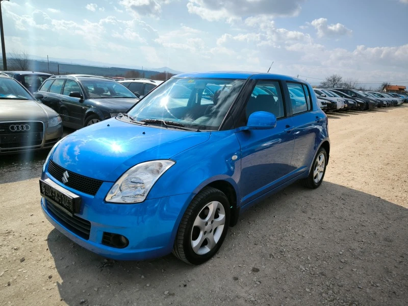 Suzuki Swift 1.3I 4X4, снимка 3 - Автомобили и джипове - 44400466