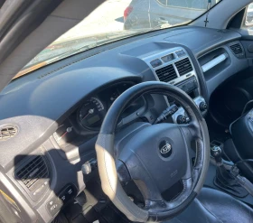 Kia Sportage 2.0 16 v 4x4, снимка 6