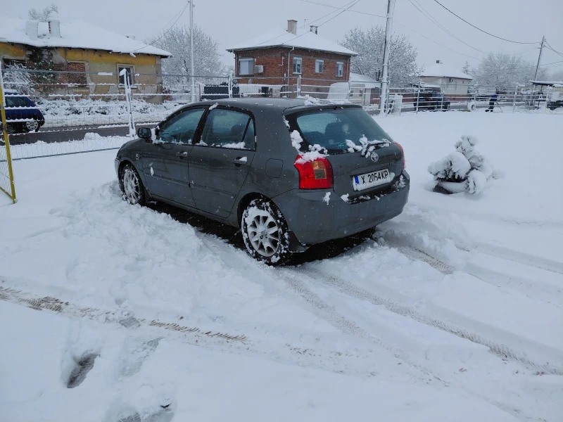 Toyota Corolla 1.4i, снимка 10 - Автомобили и джипове - 53333879