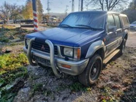 Mitsubishi L200 2.5D/4X4/, снимка 2