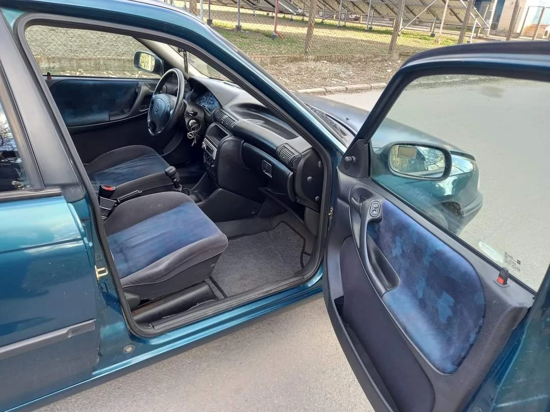 Opel Astra 1.4/80 коня, снимка 14 - Автомобили и джипове - 55967557