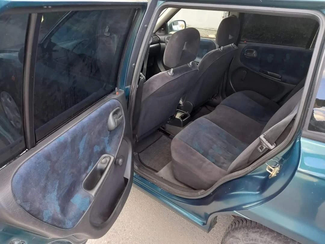 Opel Astra 1.4/80 коня, снимка 7 - Автомобили и джипове - 55967557