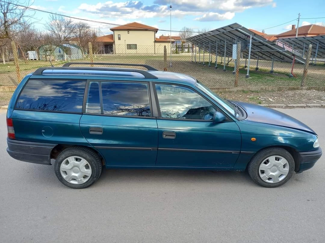 Opel Astra 1.4/80 коня, снимка 11 - Автомобили и джипове - 55967557