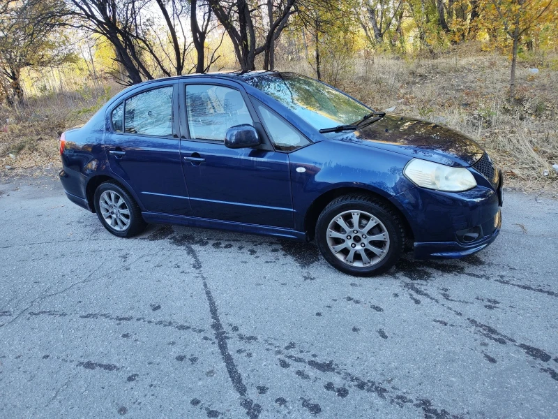 Suzuki SX4 1.6i, снимка 8 - Автомобили и джипове - 48741831