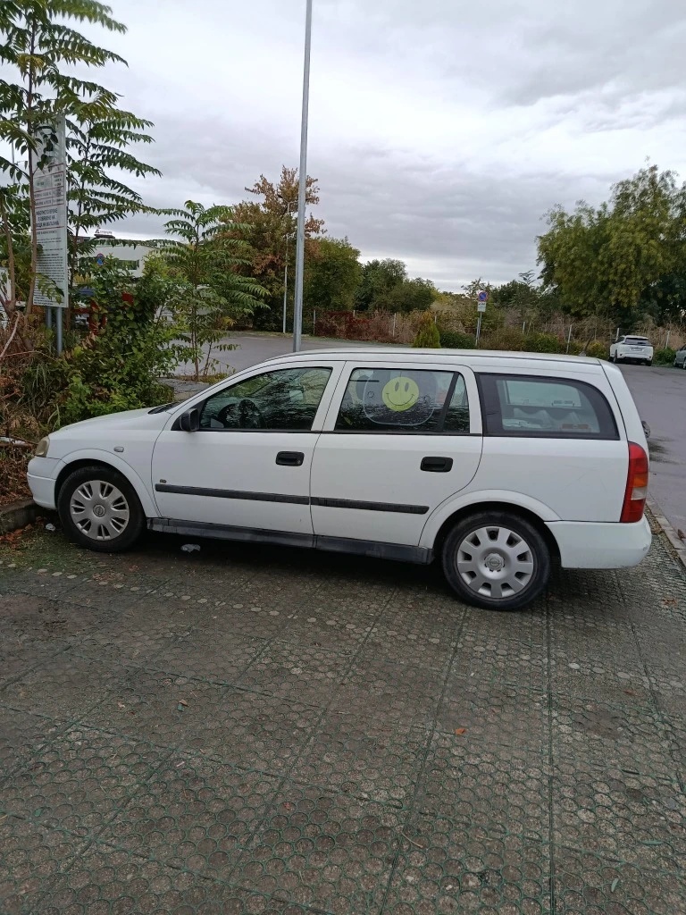 Opel Astra, снимка 13 - Автомобили и джипове - 56739565