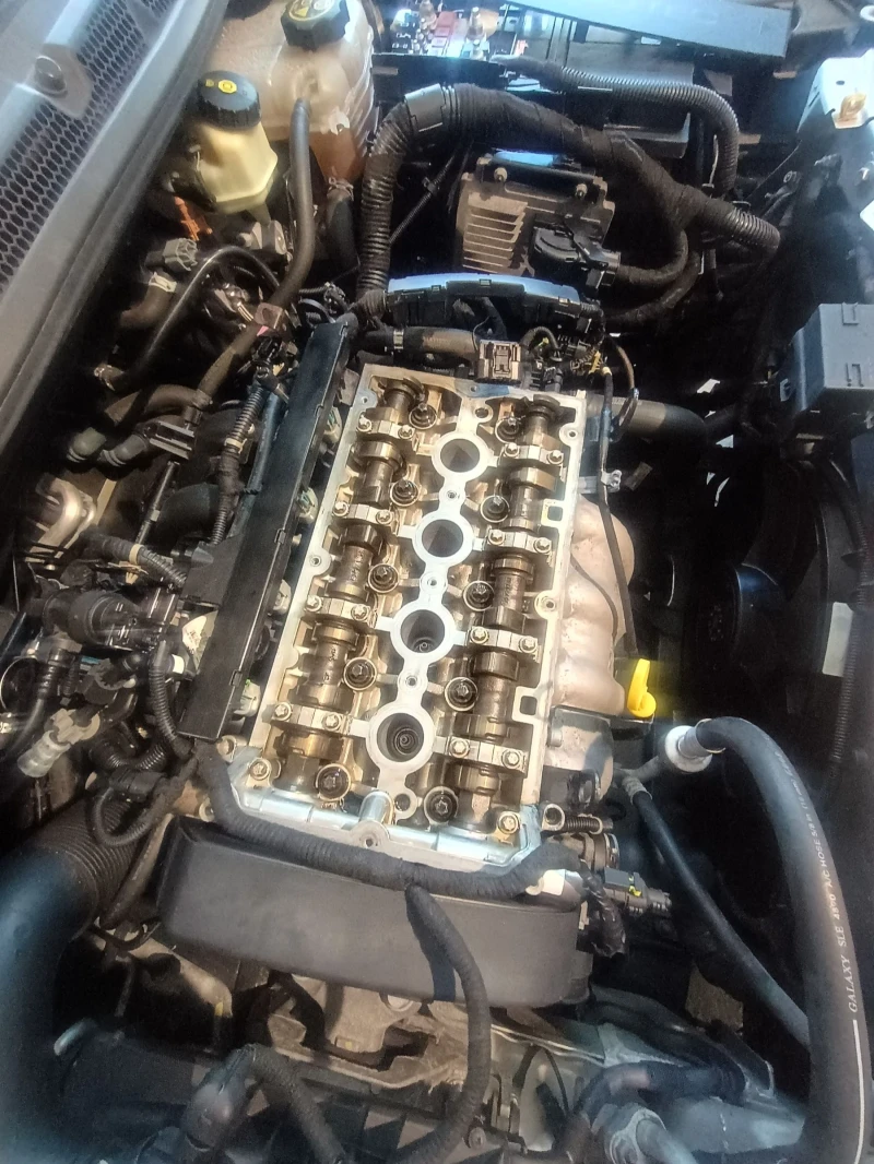 Opel Astra 1.6vvt 116кс, снимка 12 - Автомобили и джипове - 51317572