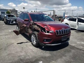 ������ Jeep Cherokee