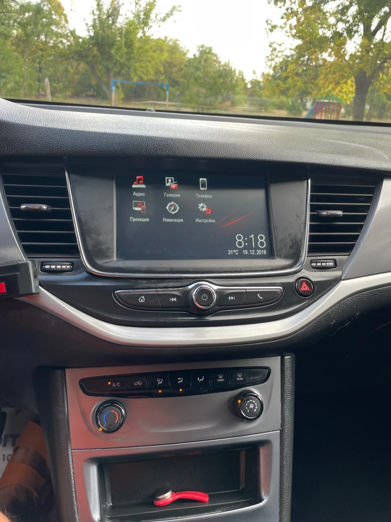 Opel Astra SPORTS TOURER 1.2 Bns Edition, снимка 9 - Автомобили и джипове - 49032174