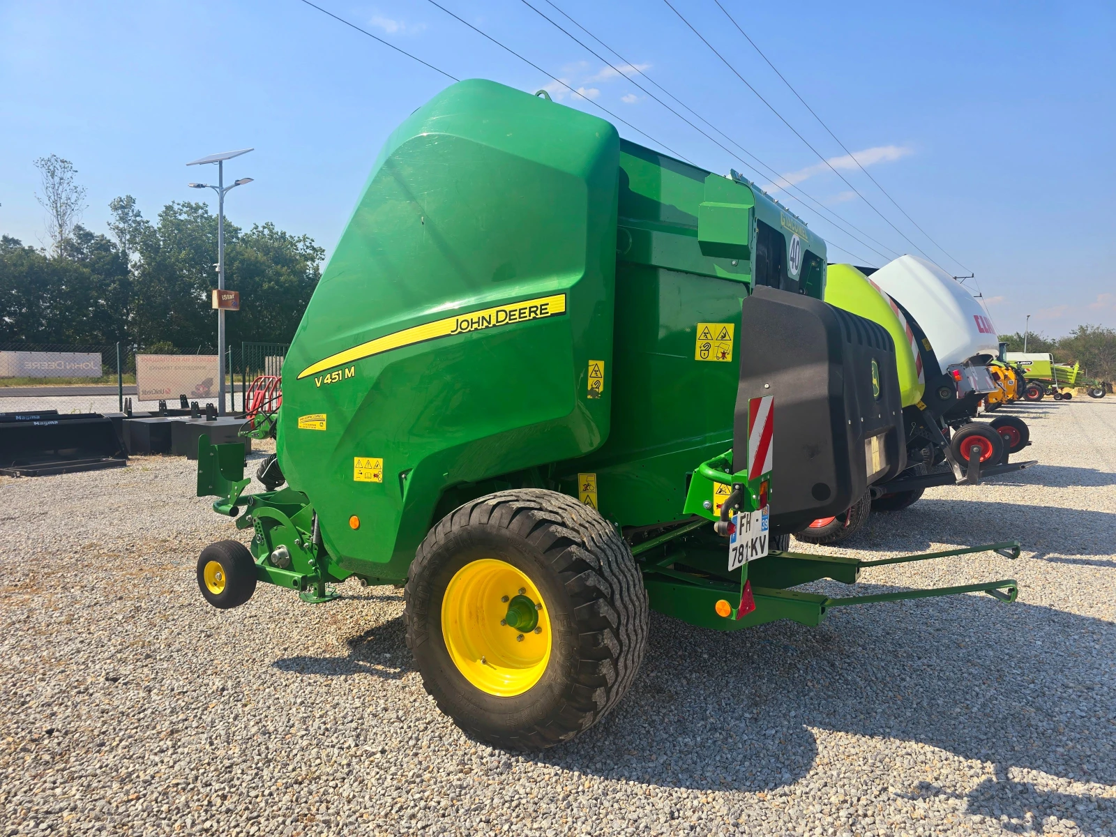 Балировачка John Deere V451M - изображение 7